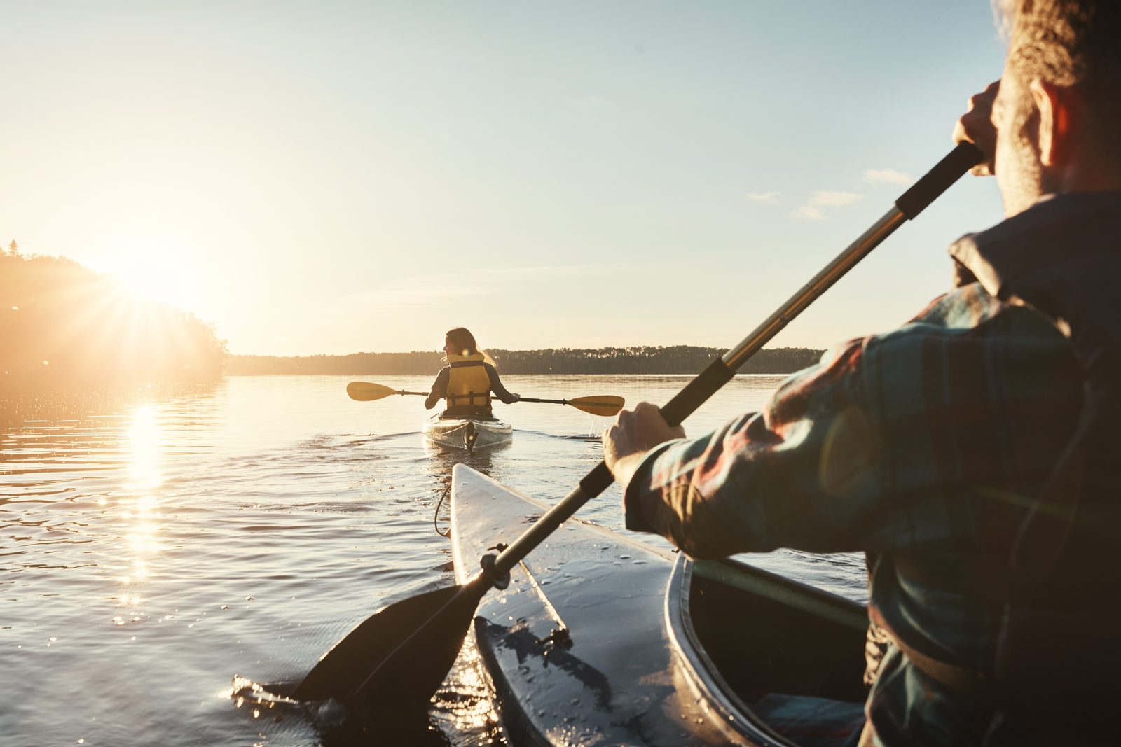 Kayaking on Okanagan Lake in golden light